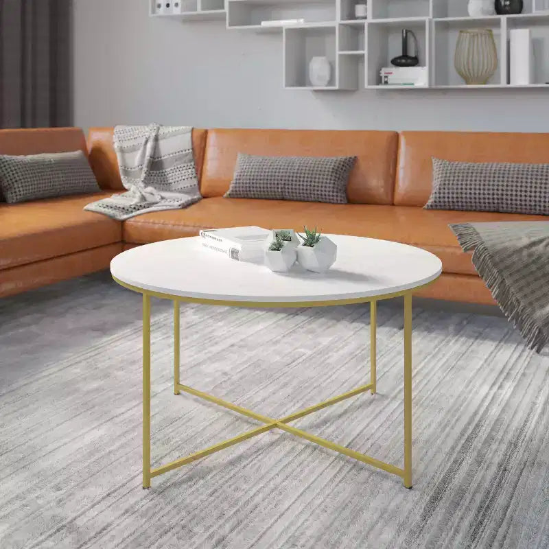 Table basse ronde moderne avec cadre en métal noir mat entrecroisé, plateau stratifié blanc